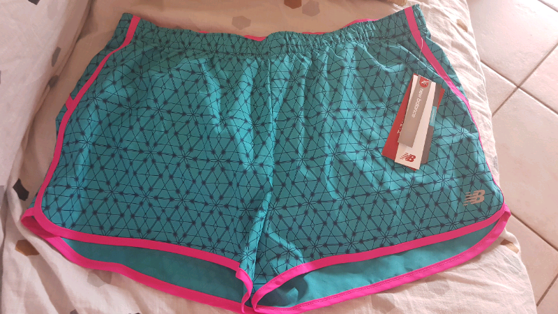 new balance lightning dry shorts